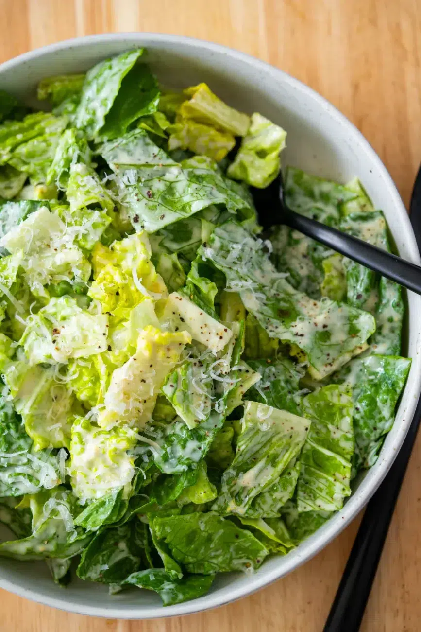 Lettuce dressed with Caesar Salad Dressing