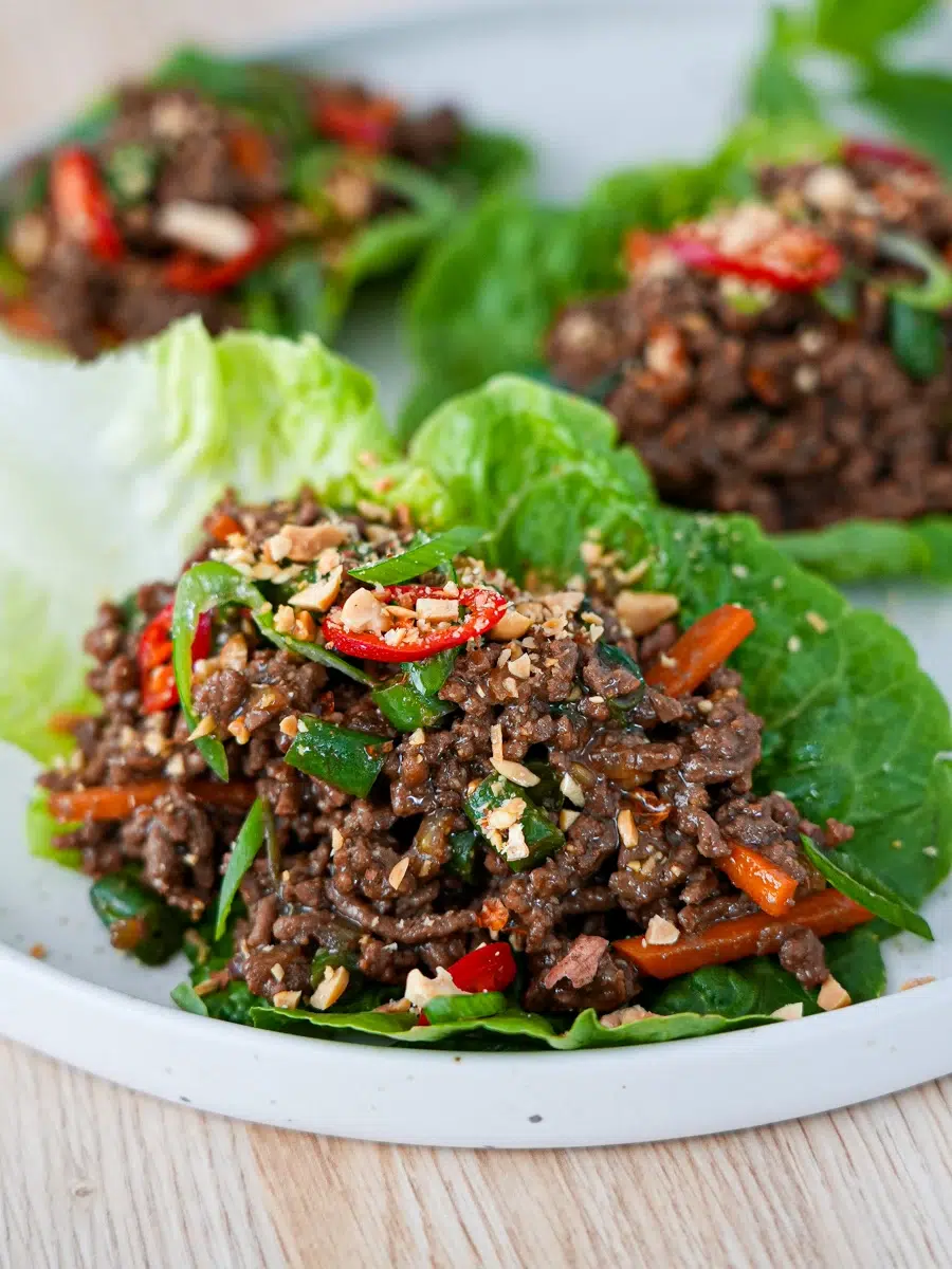 Juicy Thai Beef Lettuce Cups on a white plate