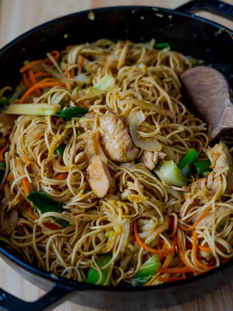 Side view of Chicken Lo Mein in a pan.