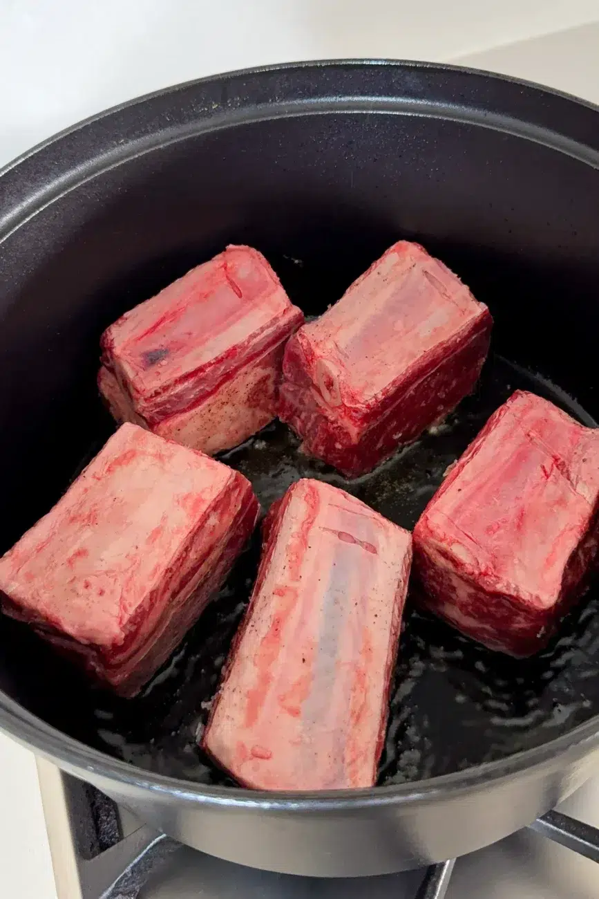 Browning Beef Short Ribs in Heavy Pot
