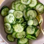 dill cucumber salad recipe in pink bowl