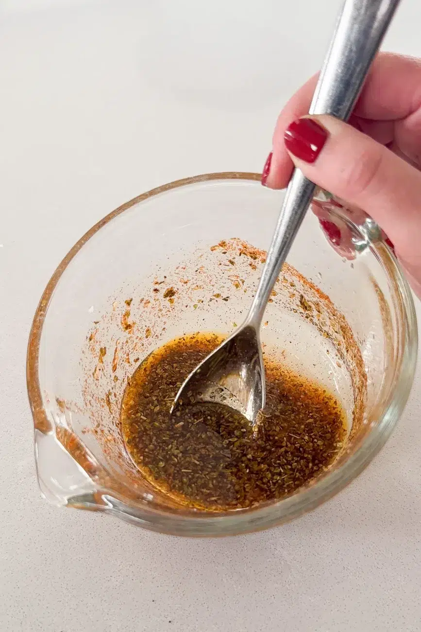 Chicken souvlaki marinade recipe mixed together in jug