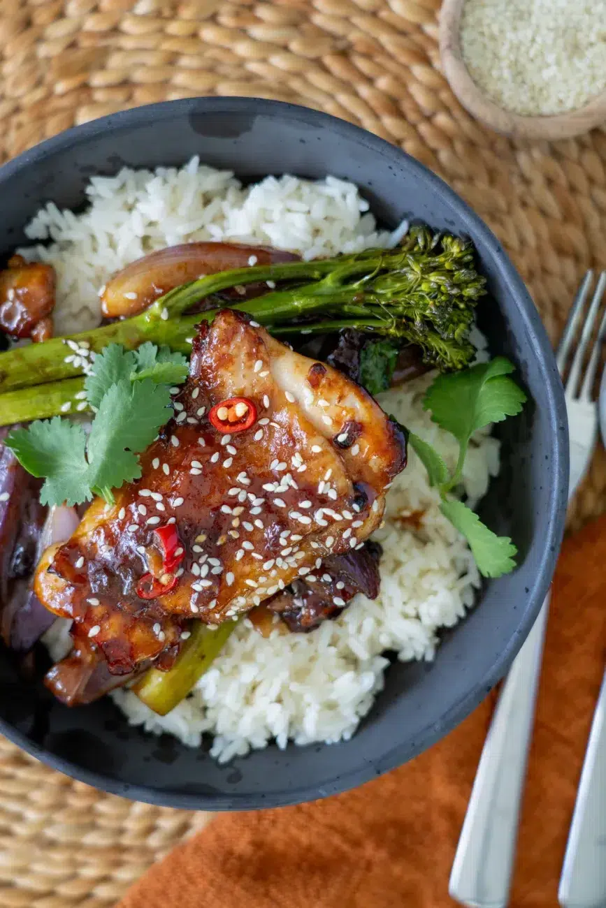 Plated Honey soy chicken traybake with jasmine rice