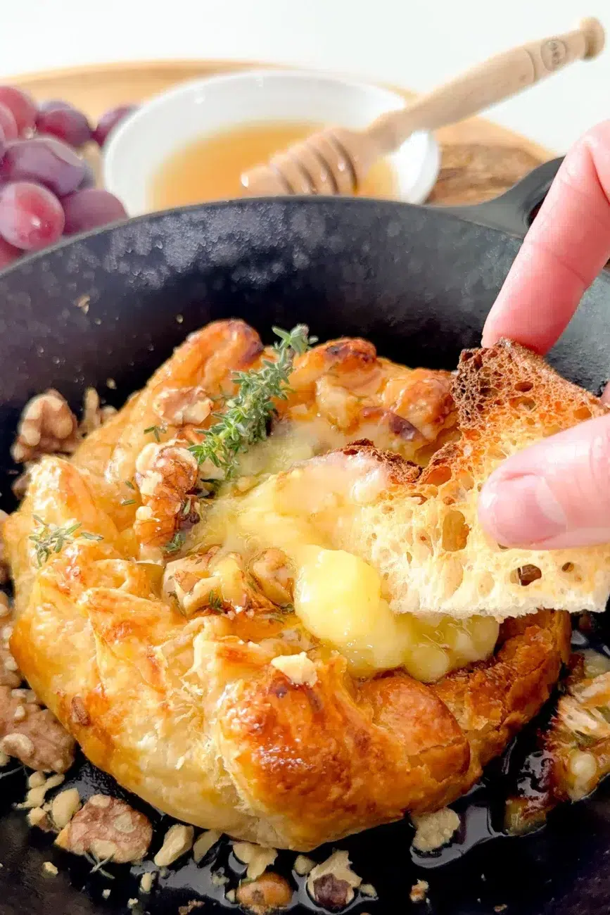 Baked Brie with a piece of dipping bread