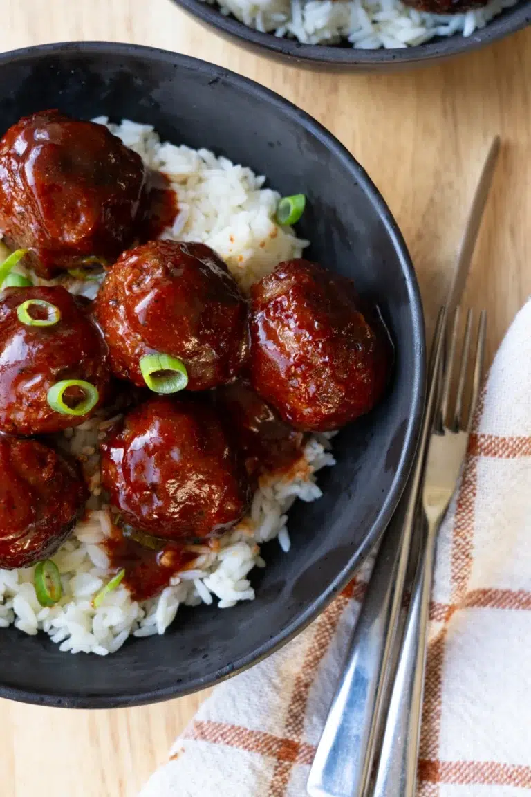 Finished meatballs close-up plated up with rice