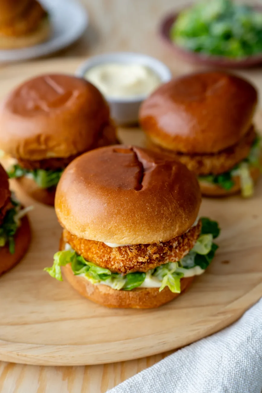 Crispy minced chicken burgers served on platter