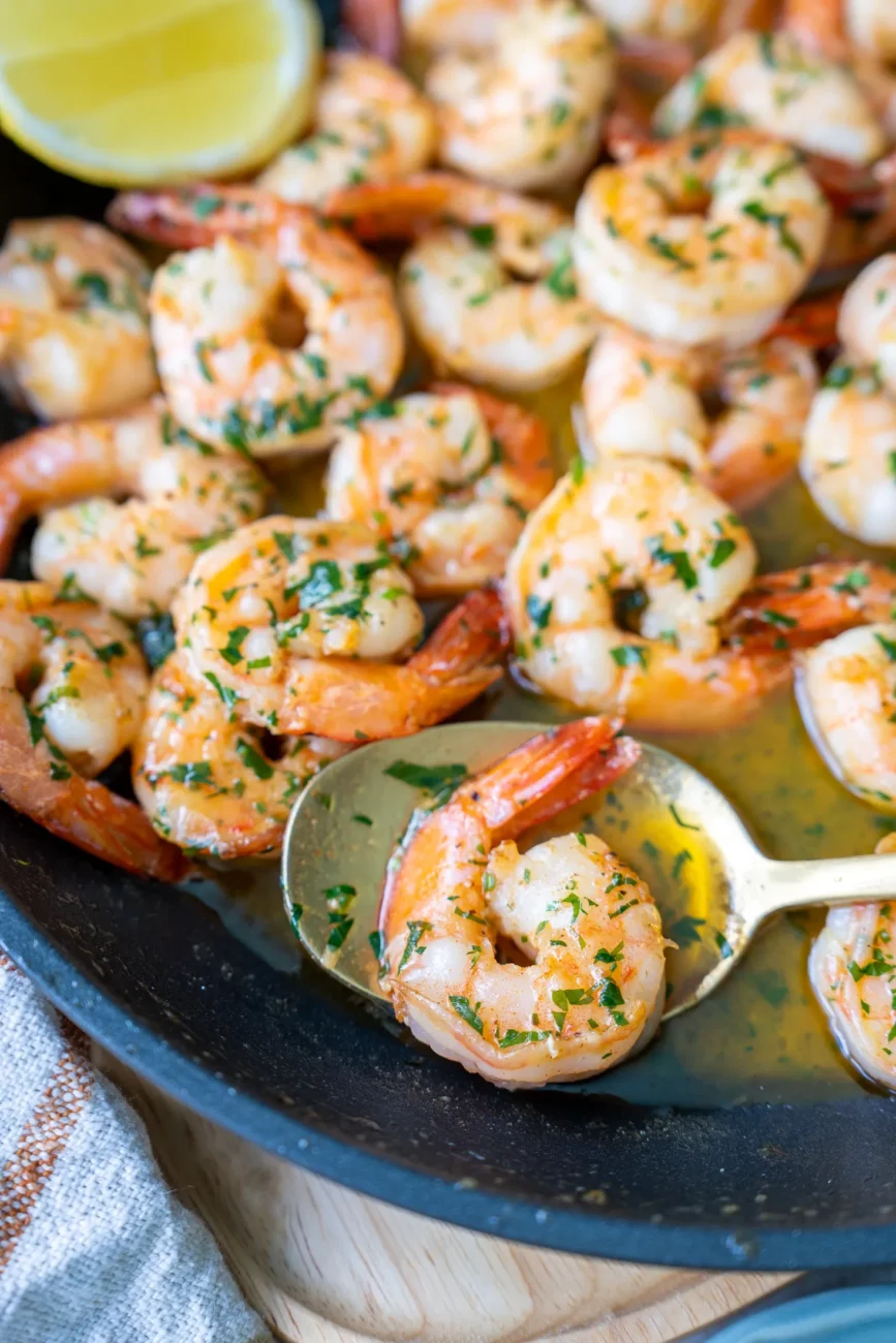 Garlic prawns in pan closeup